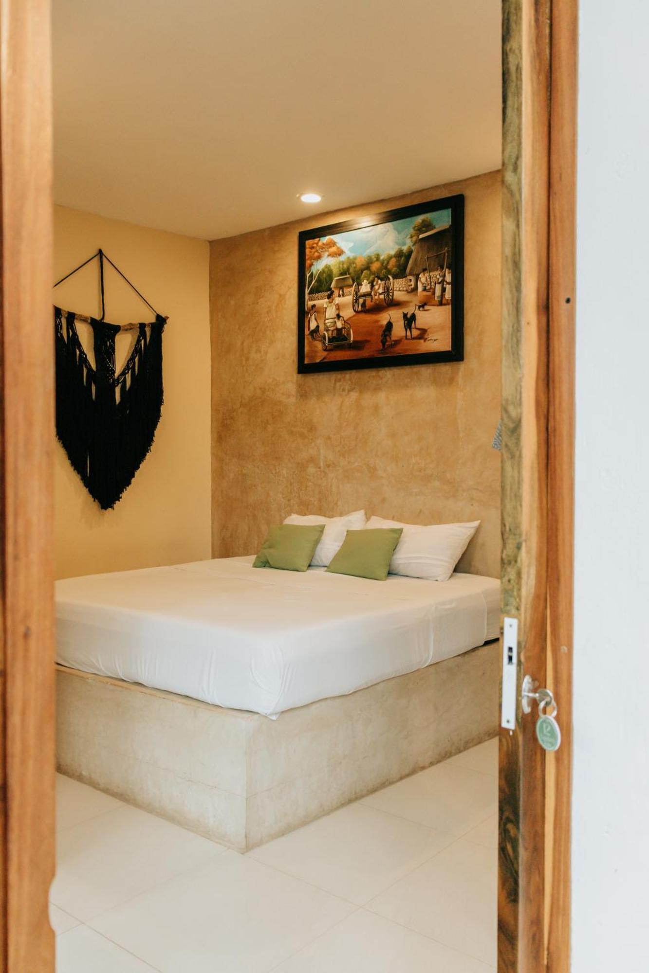 Tunich Naj & Hostal *