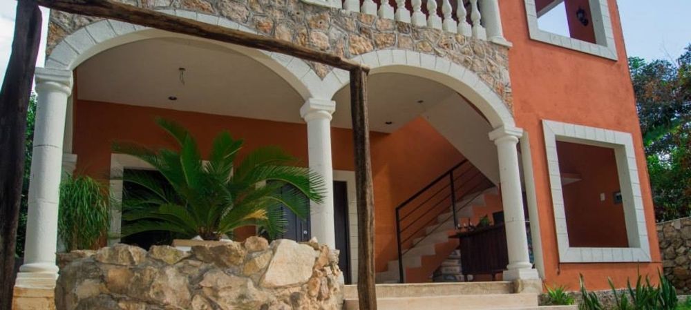 Tunich Naj & Hostal *